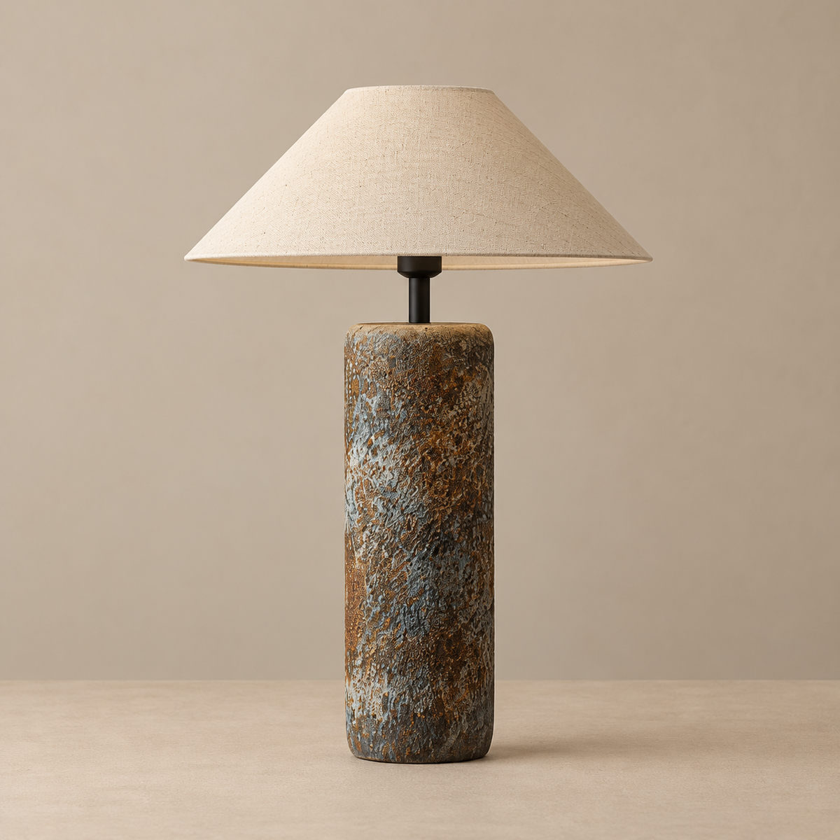 Large textured ceramic table lamp switched off on a beige background
