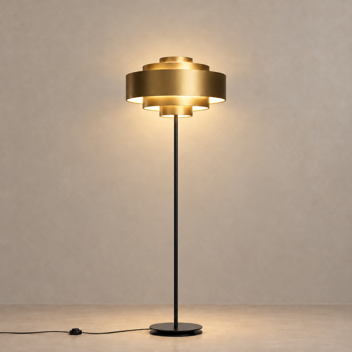CL85070M brass floor lamp illuminated through the openings of its tiered shade.