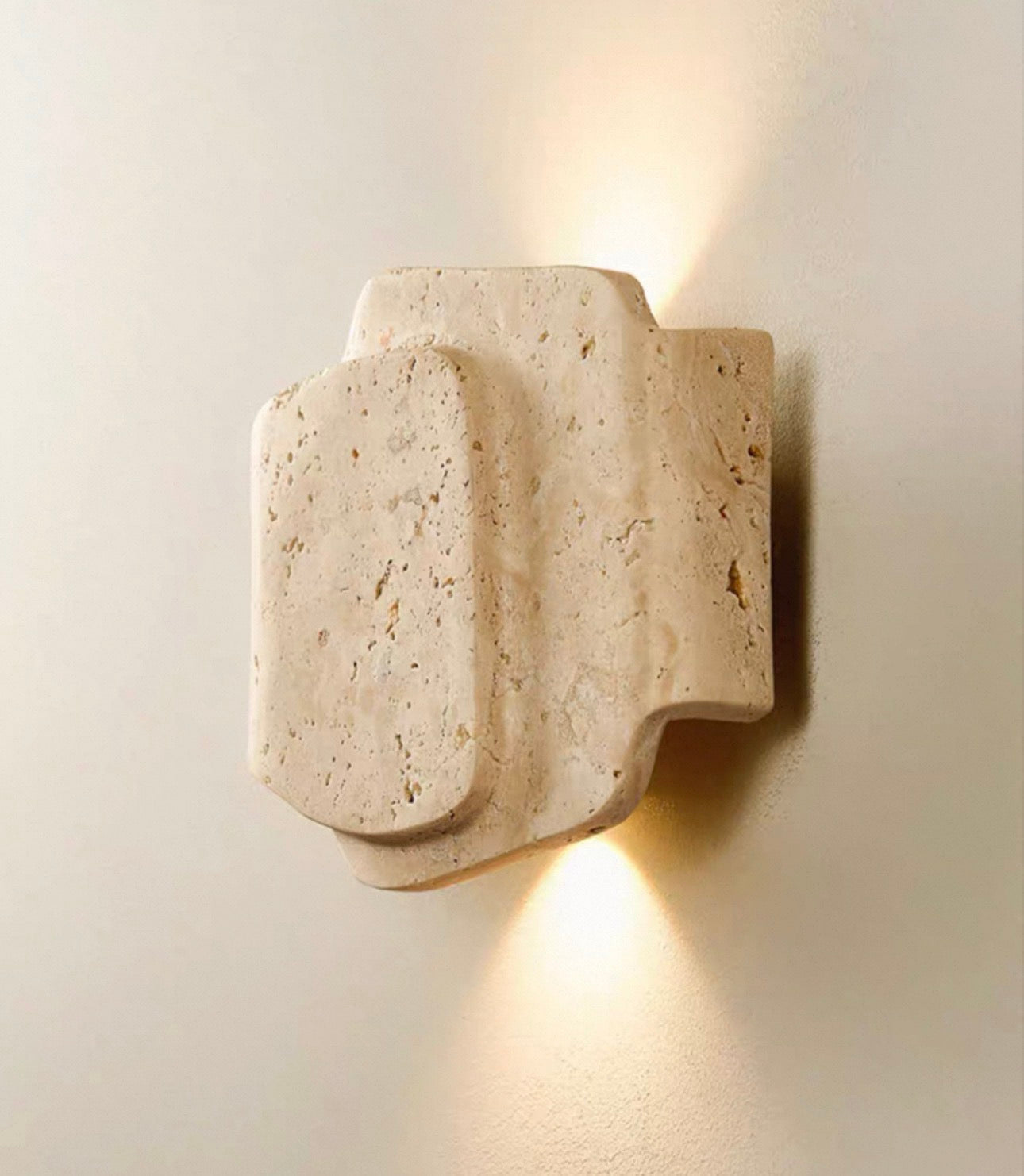 Natural travertine texture and pores in the lit stone