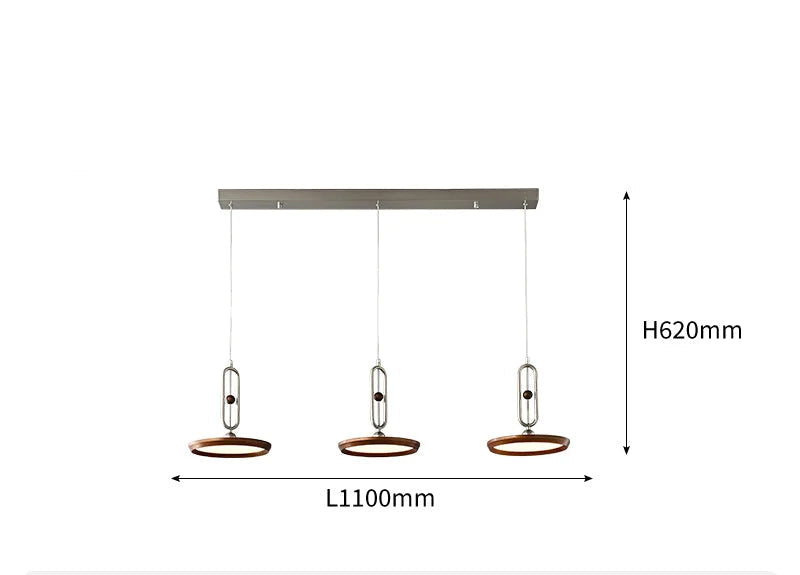 Linear branch pendant over a kitchen island