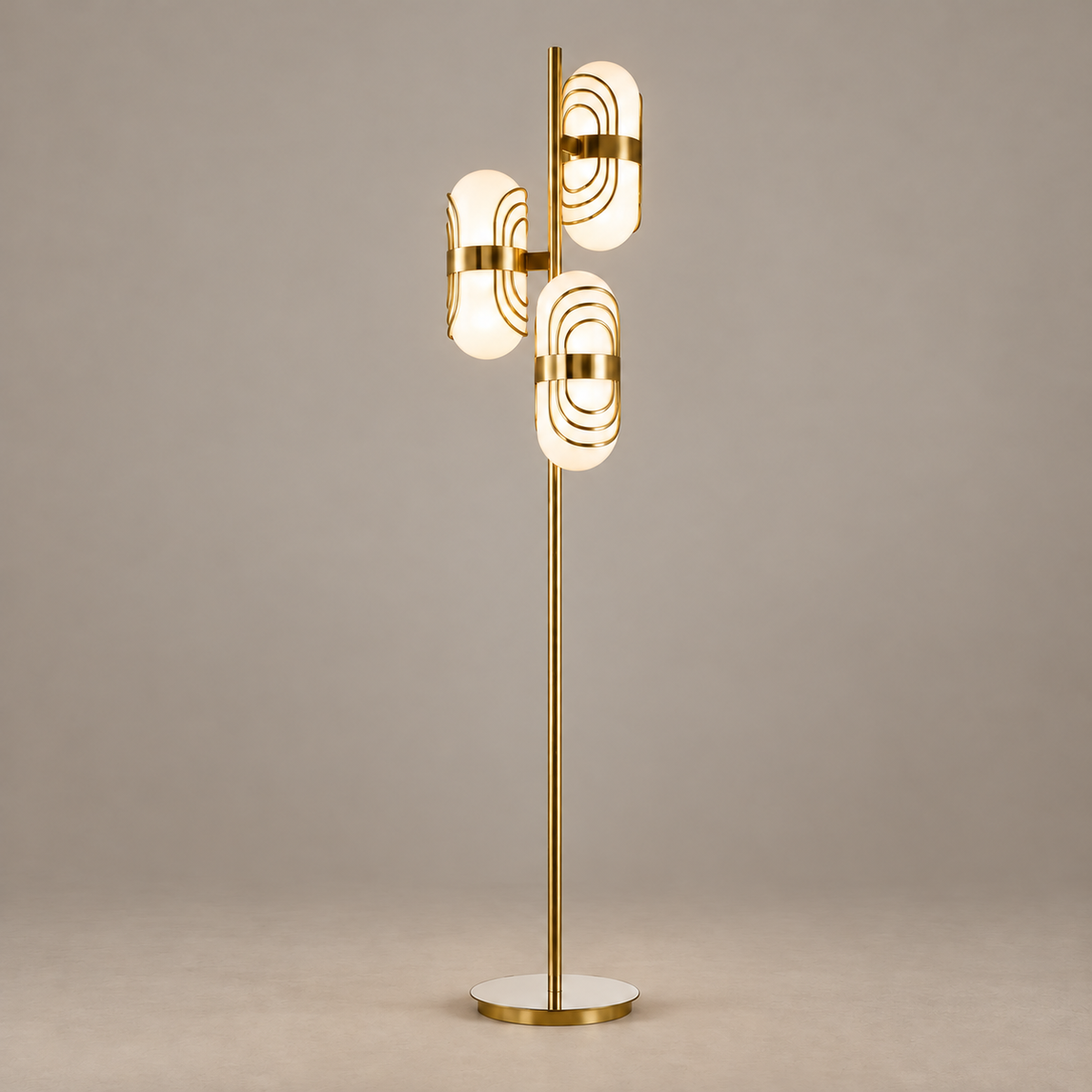 Tris three-light floor lamp illuminated against a stone-beige background.
