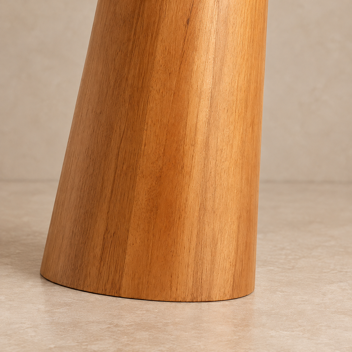 Detail of the natural grain and tapered wooden foot of CL333320.