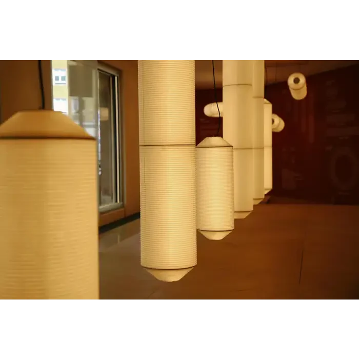 Japandi-minimalist rice-paper column light in a bedroom