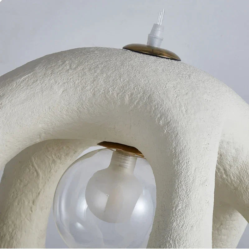 Sculptural resin pendant in a modern interior