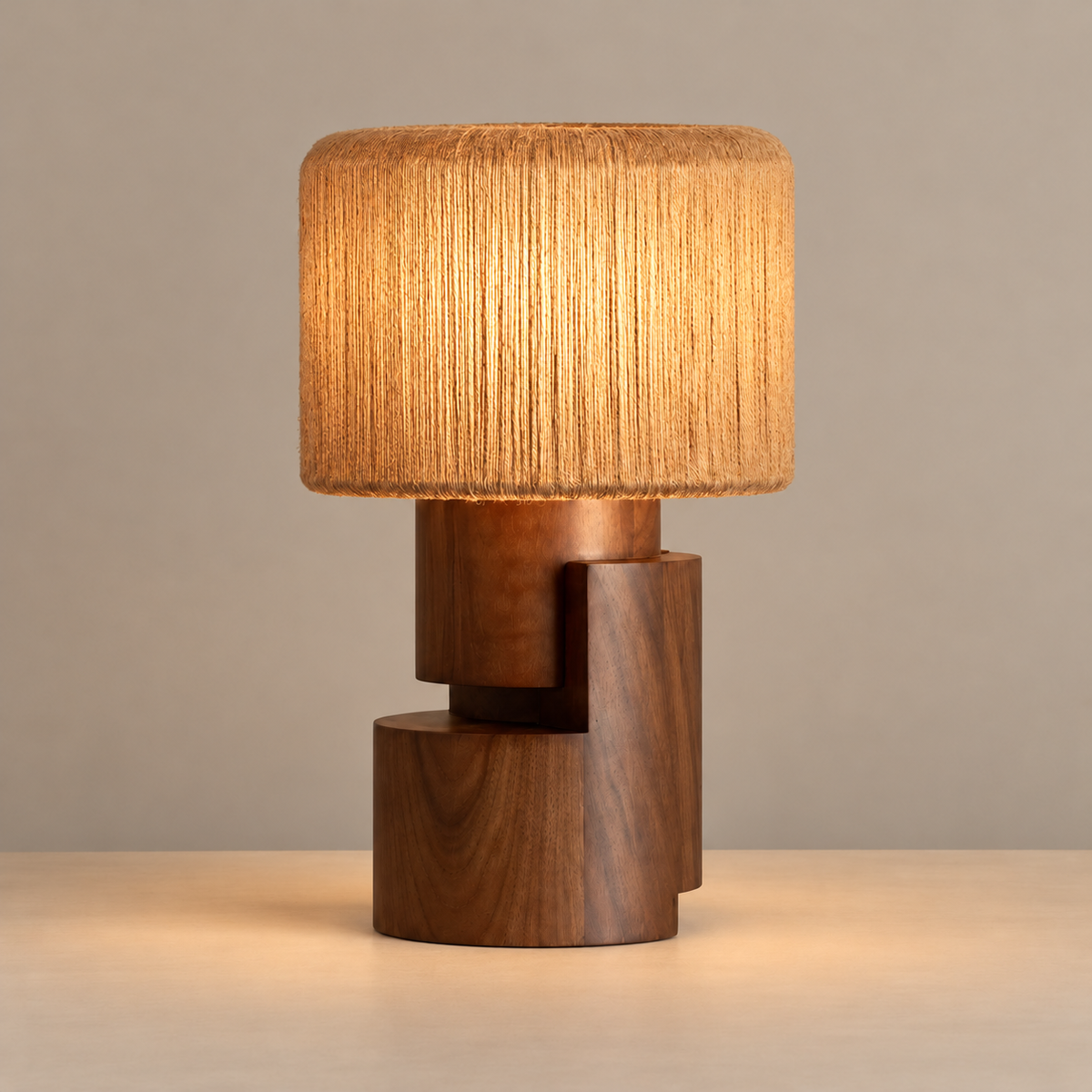 Walnut Table Lamp, illuminated, on a beige background.