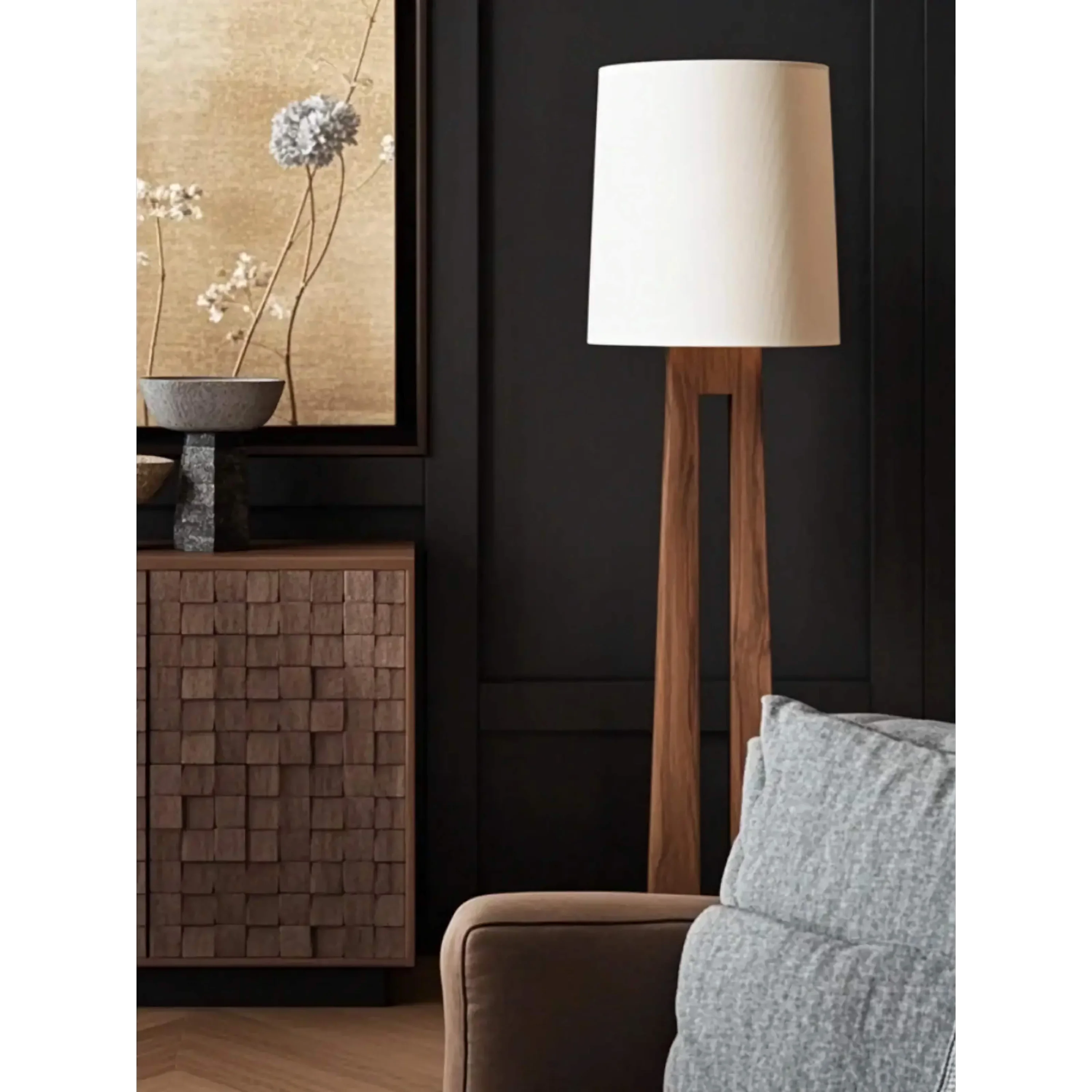 Walnut floor lamp glowing soft in a reading nook