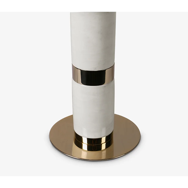White marble and brass table lamp in a living room