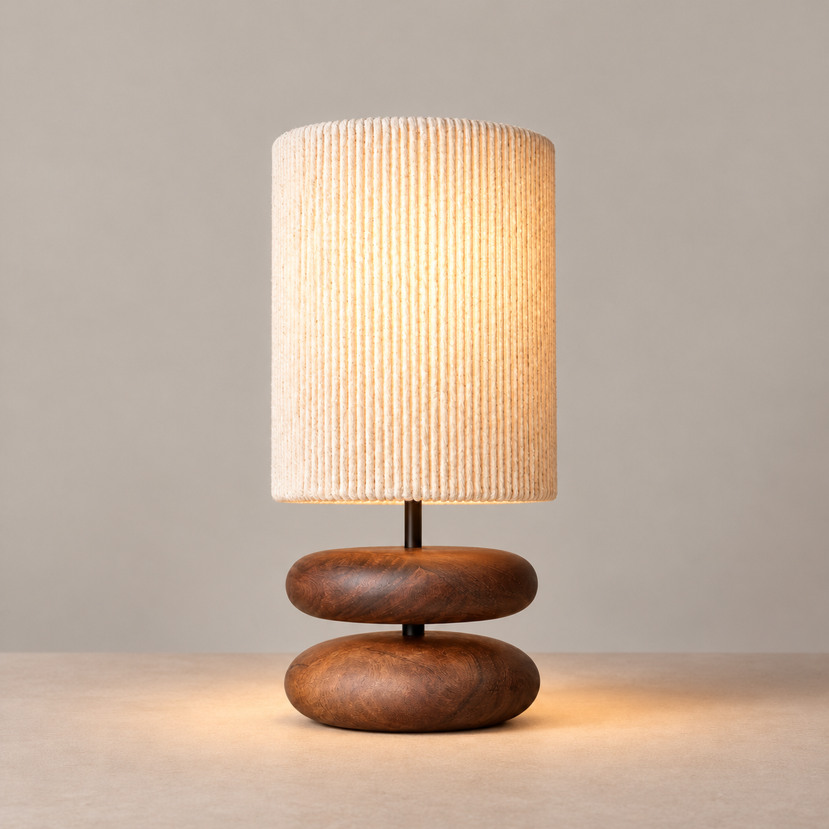 Zen walnut table lamp illuminated on a beige background