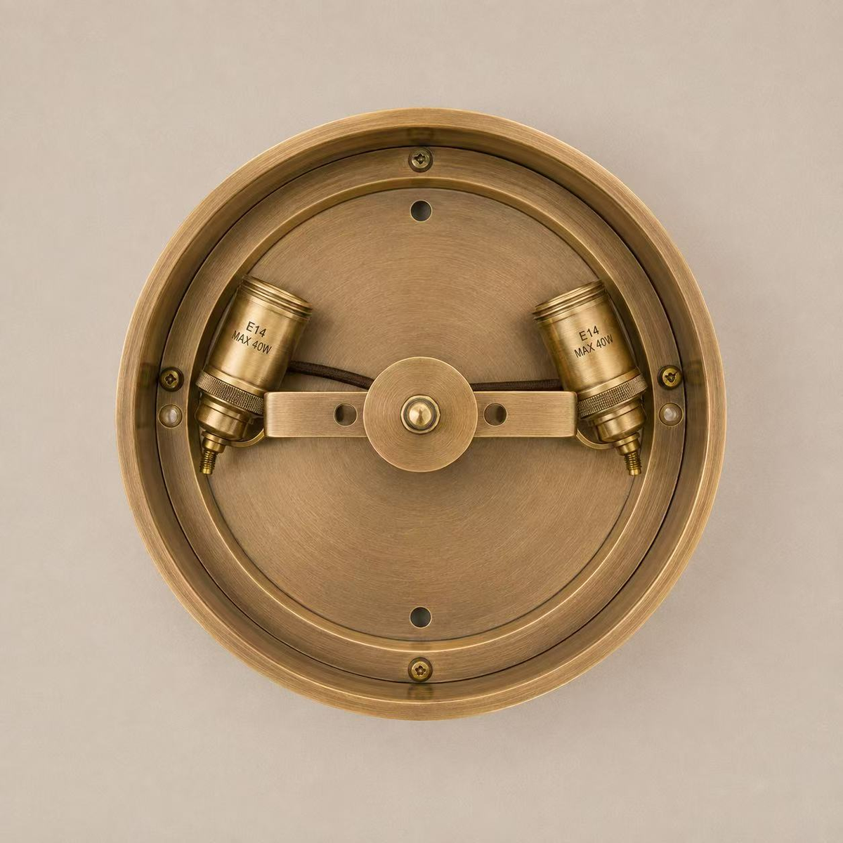 Solid brass back plate of the alabaster flush mount with two E14 lamp holders