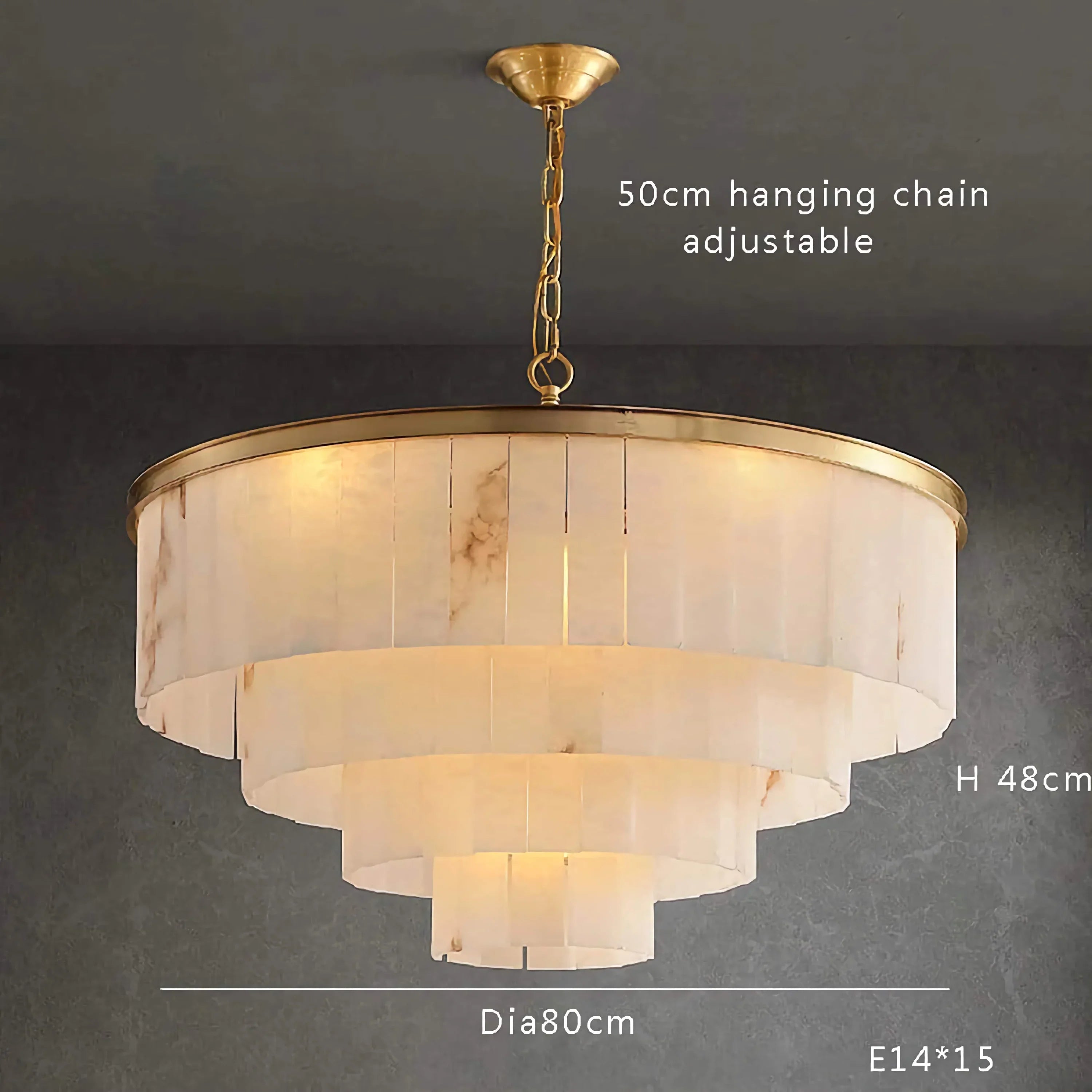 Art Deco tiered alabaster chandelier glowing warm