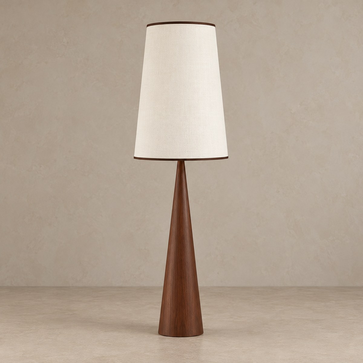 Walnut CLBAK floor lamp switched off, with a tapered wood column and tall cream fabric shade.