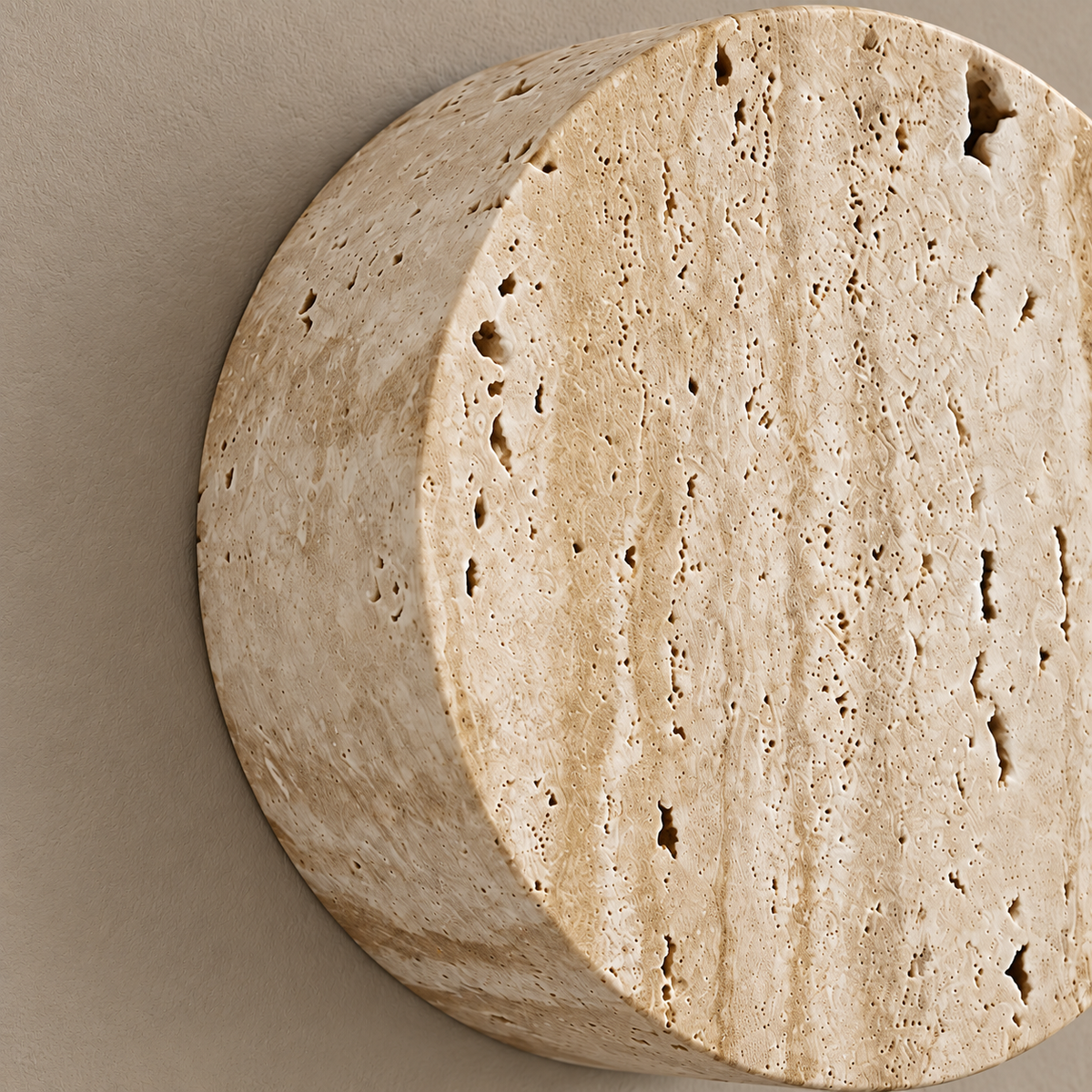 Bonetti travertine cylinder wall light, close view of the natural stone and mounting