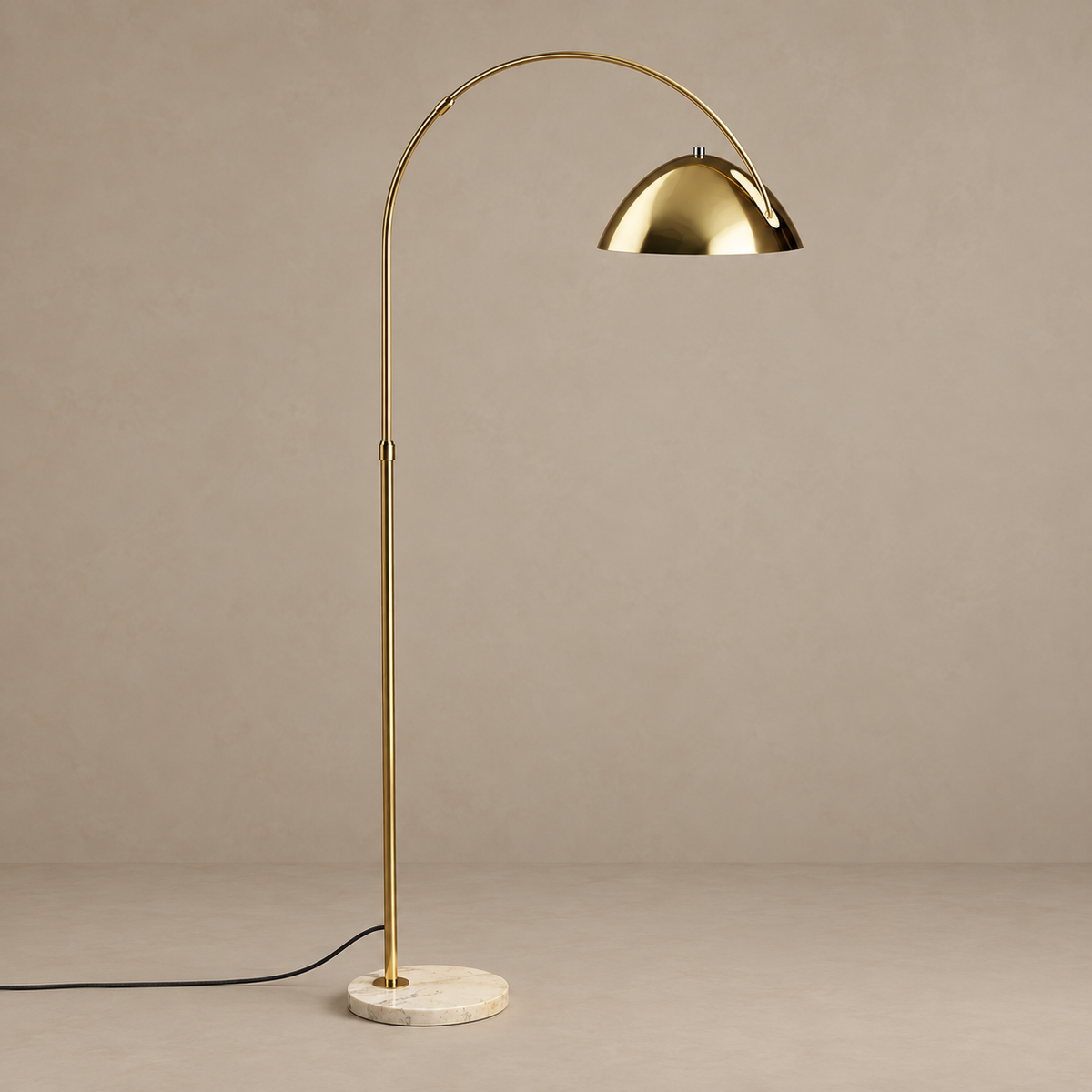 Gold CL55124 arc floor lamp switched off, with a domed metal shade and pale marble base.