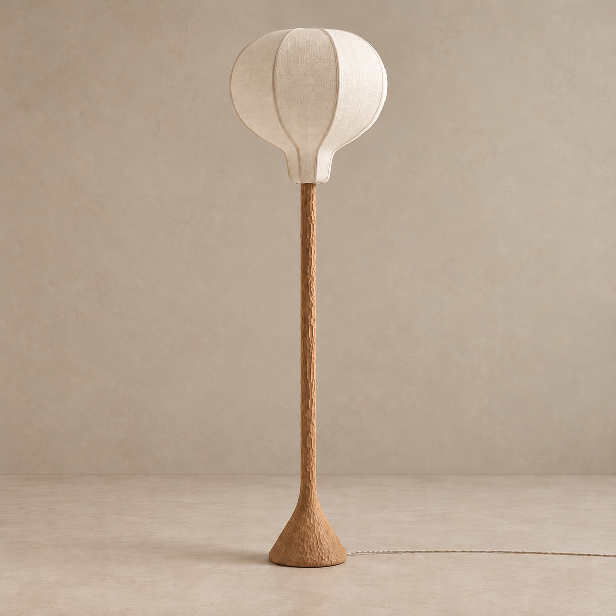 CL70ZZ floor lamp switched off, with a cream linen Balloon shade and carved oak base.