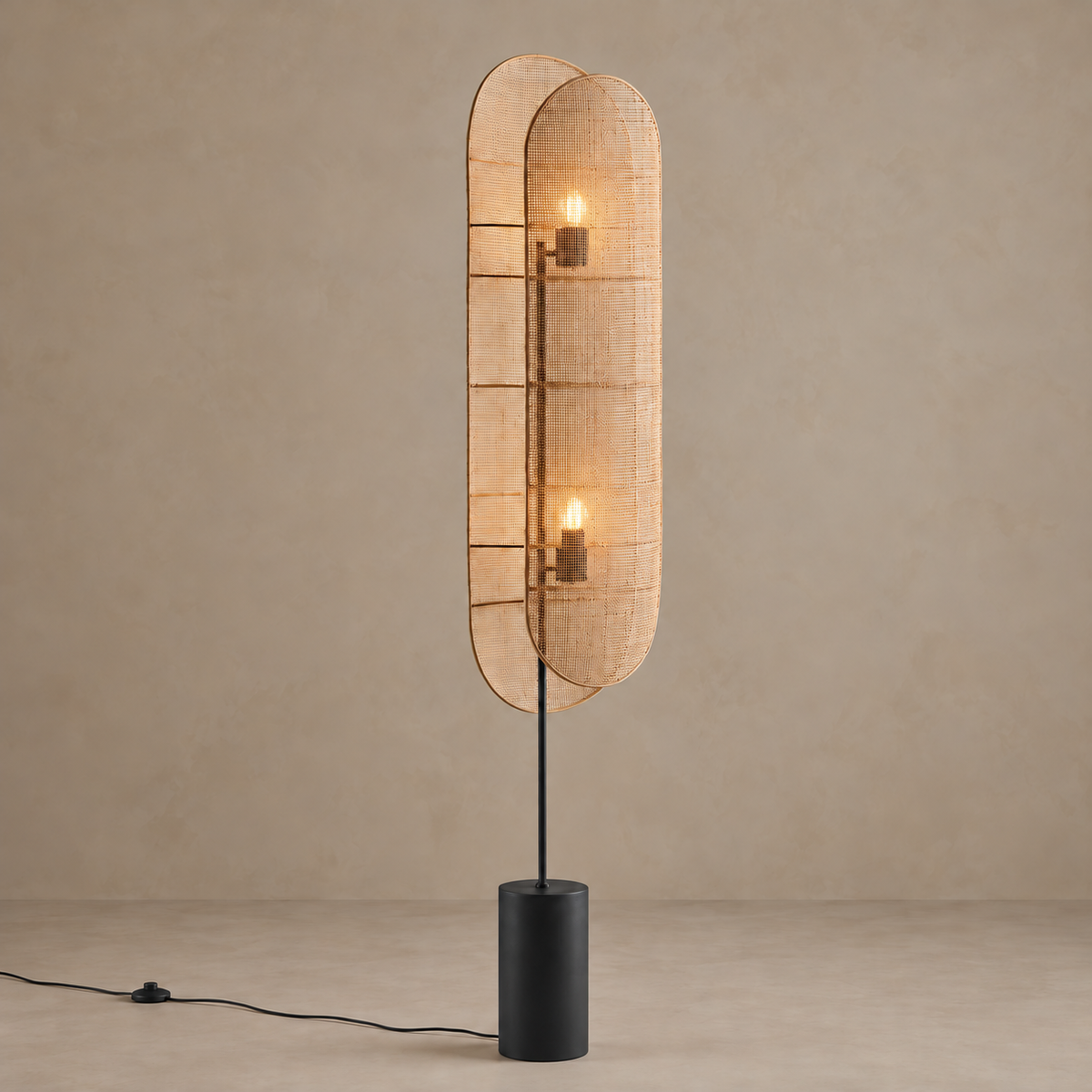 Two illuminated bulbs shining through the woven wicker panels of CL85068B.