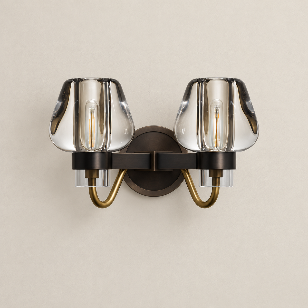 Double crystal glass wall sconce with brass arms, switched off.