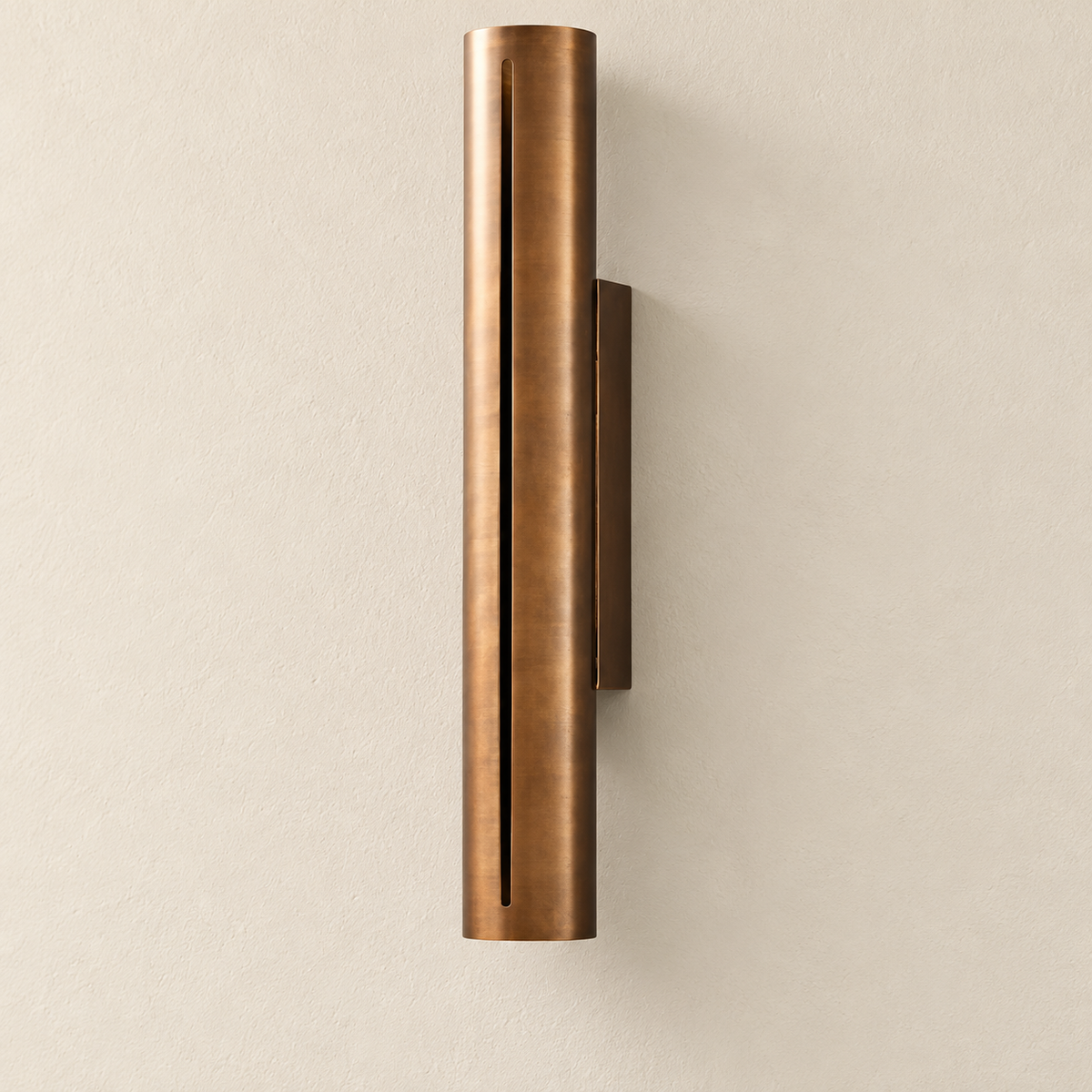 Angled view of the 55 cm copper cylinder wall light showing its rectangular mounting bracket.