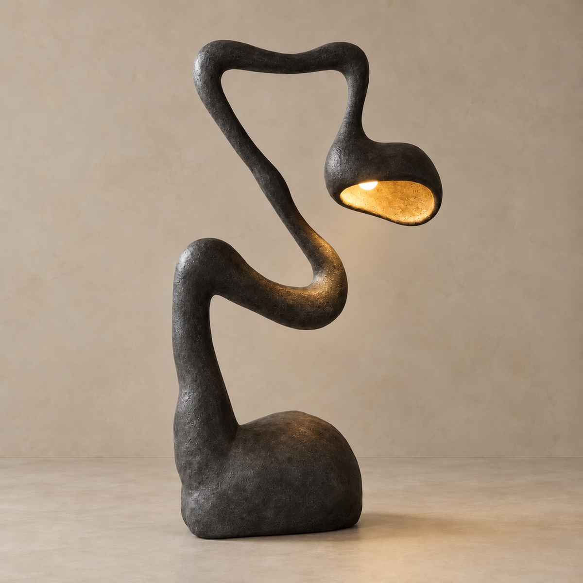 CLFAUS85D sculptural floor lamp lit, showing its gold-toned shade interior.