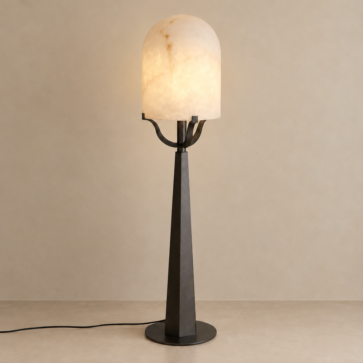Svolti CLGHT40 floor lamp with its alabaster dome illuminated.