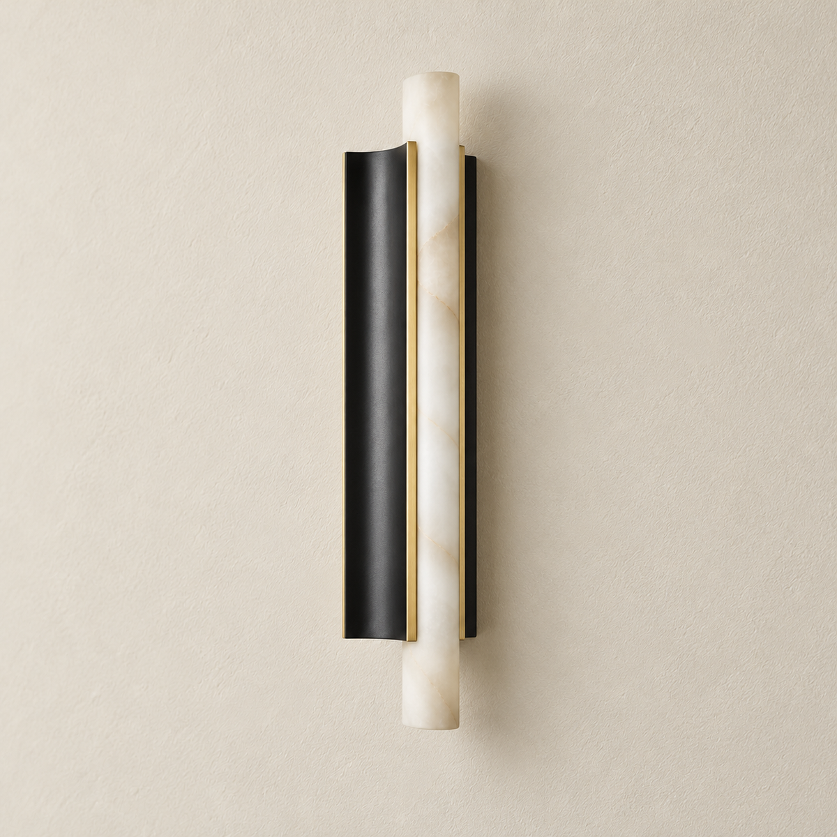 Angled view of the alabaster tube, brass rails and black wall mount.
