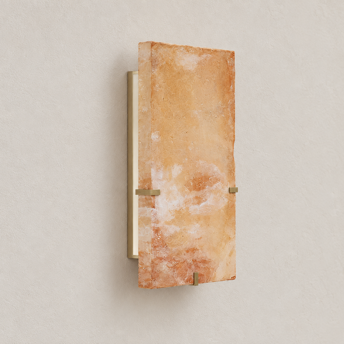 Angled view of the terracotta wall sconce showing the clay slab, retaining clips and wall projection.