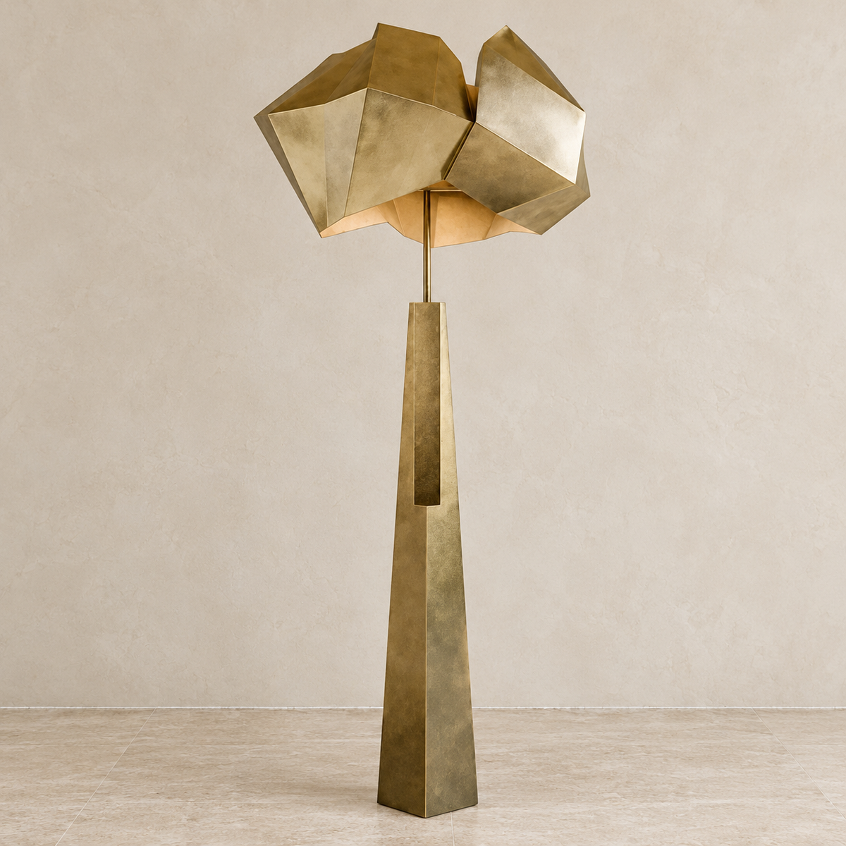 Aventine floor lamp in Antique Gold with a faceted alloy shade, switched off.