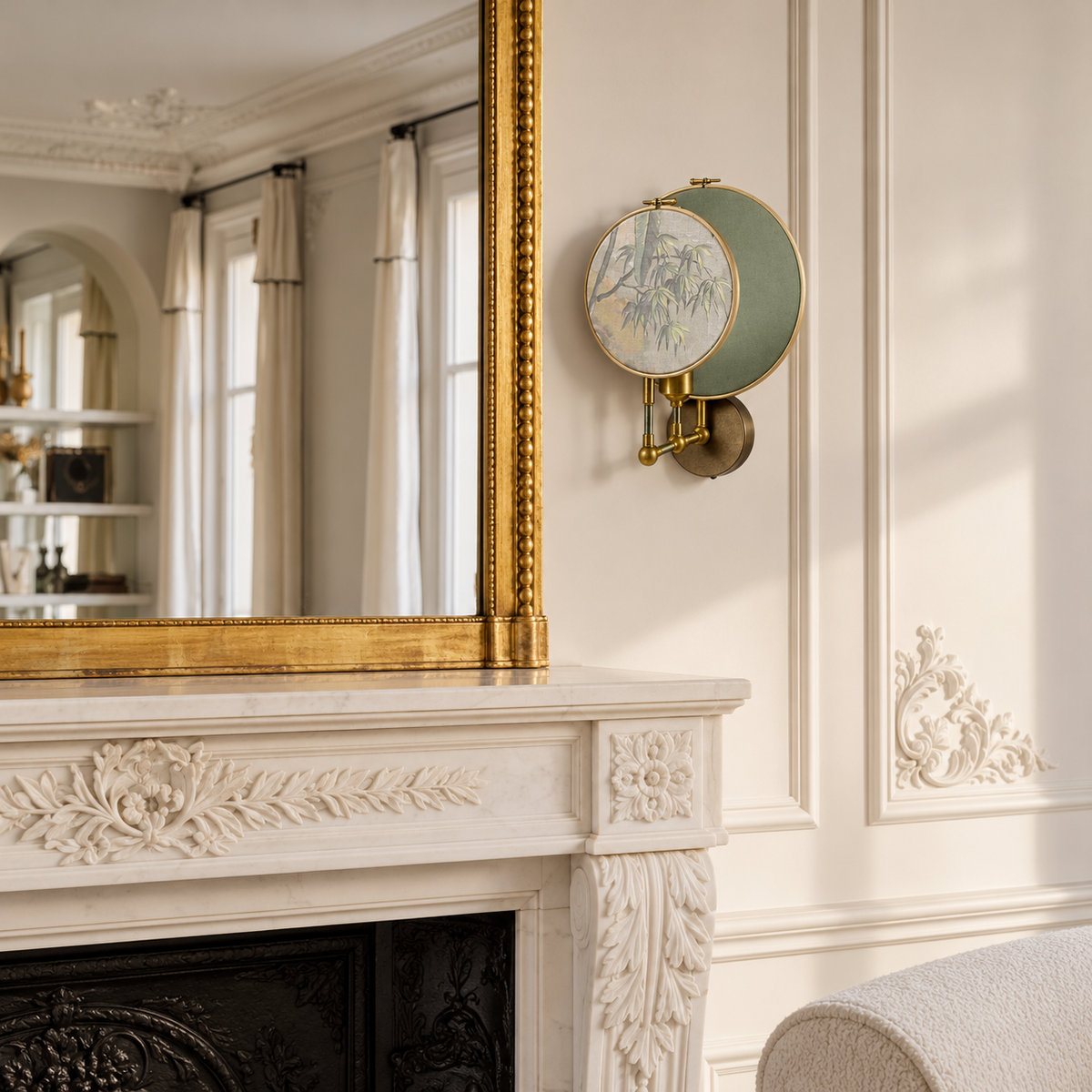 Luce di Rame botanical wall sconce beside a gilded mirror in a Parisian living room.