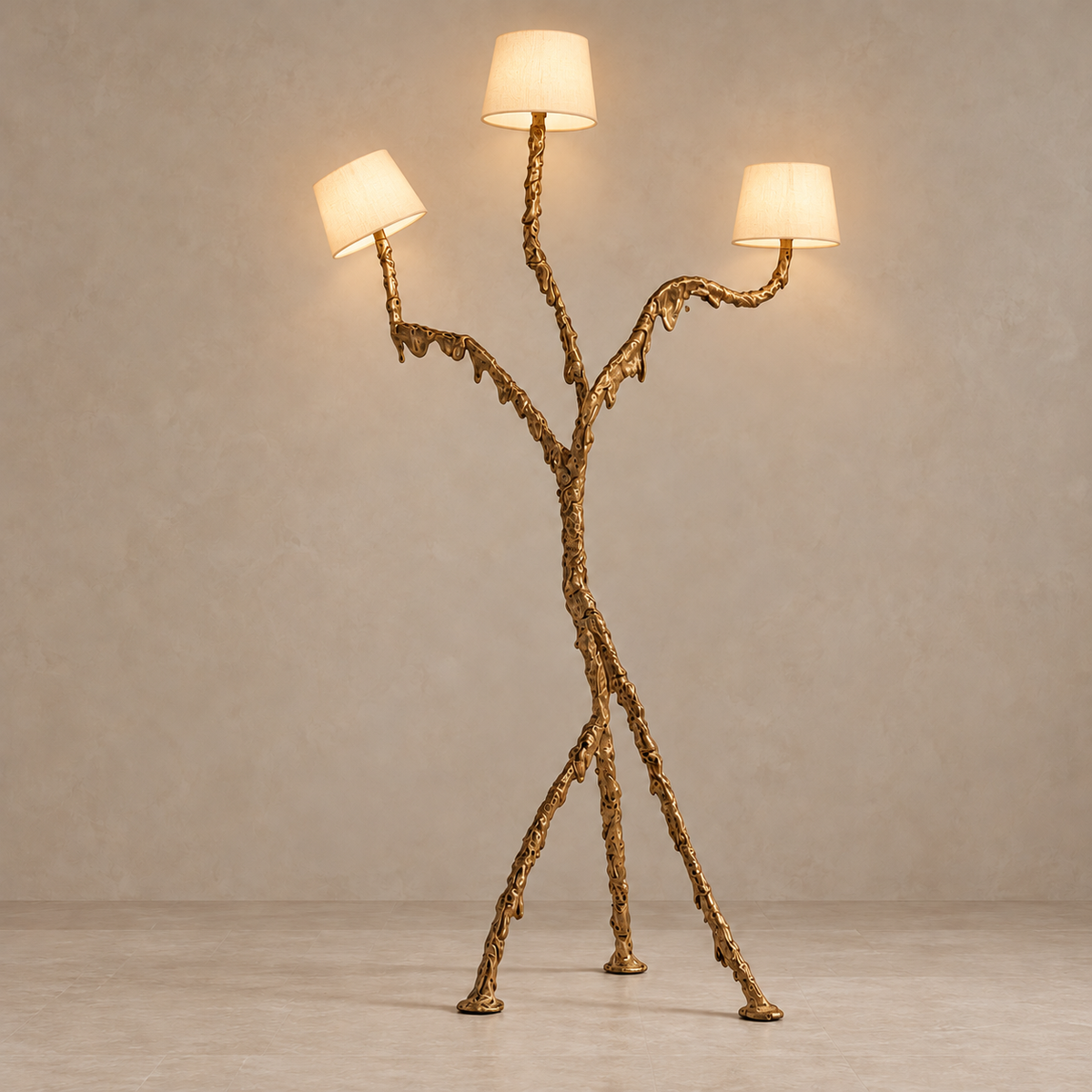 Three illuminated fabric shades on the CLPSO05F sculptural bronze floor lamp.