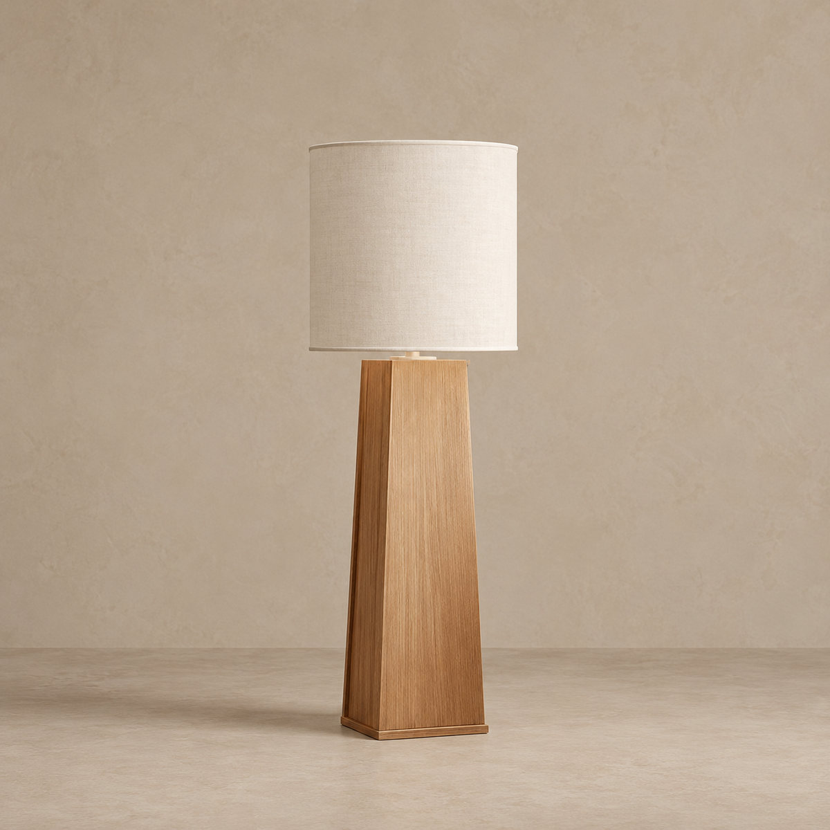 CLSTUD059 floor lamp with a tapered natural-wood column and unlit linen shade.
