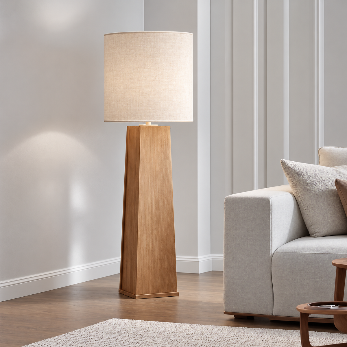 Natural-wood CLSTUD059 floor lamp beside a pale sofa in a panelled room.