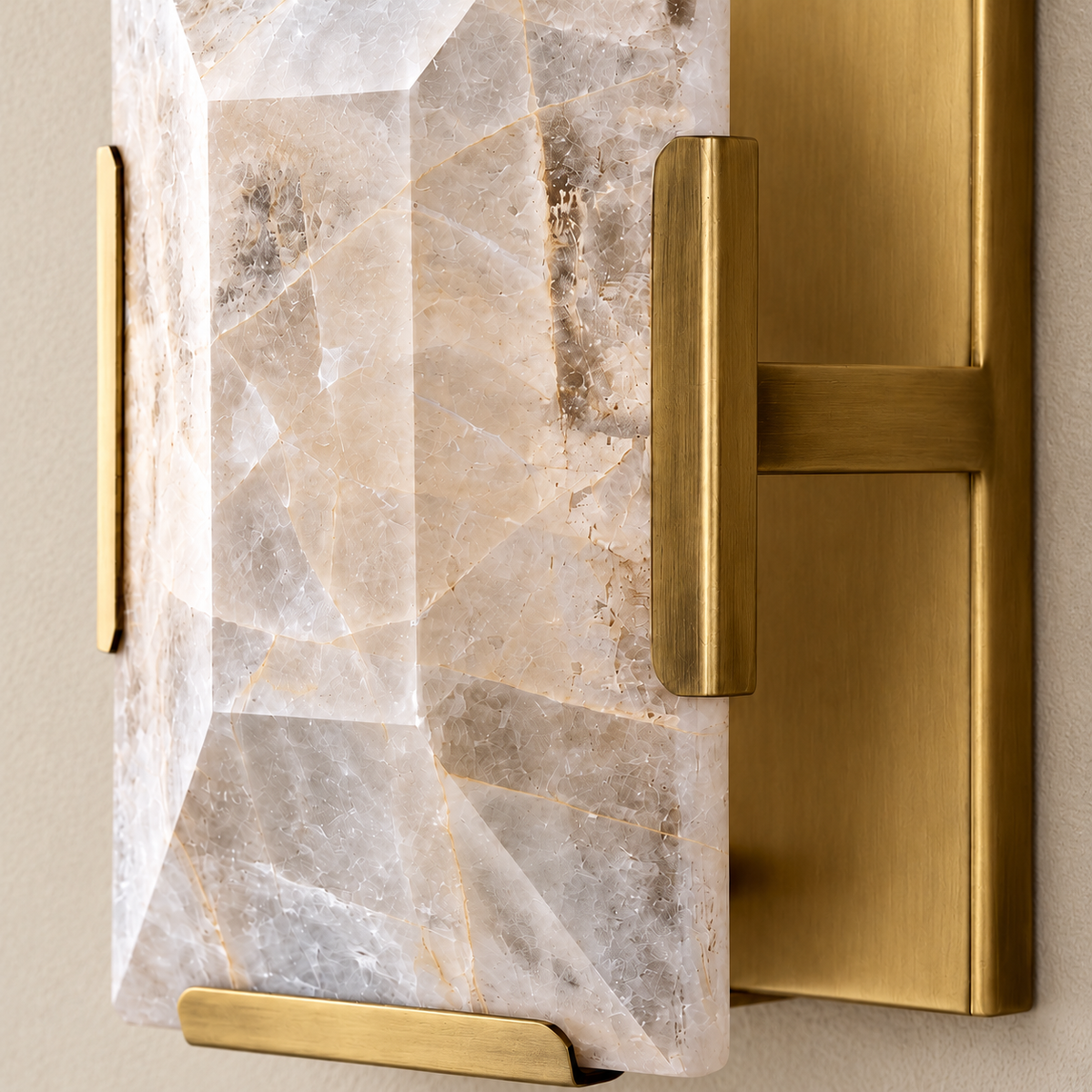 Detail of bevelled calcite and brass mounting hardware.