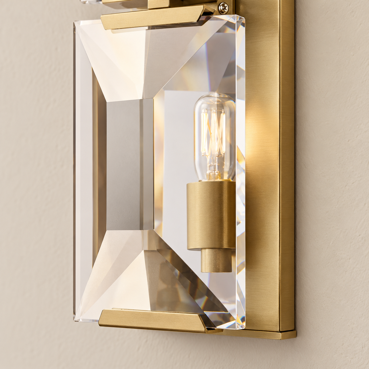 Close-up of the beveled crystal edge, retaining clip and metal bulb holder.