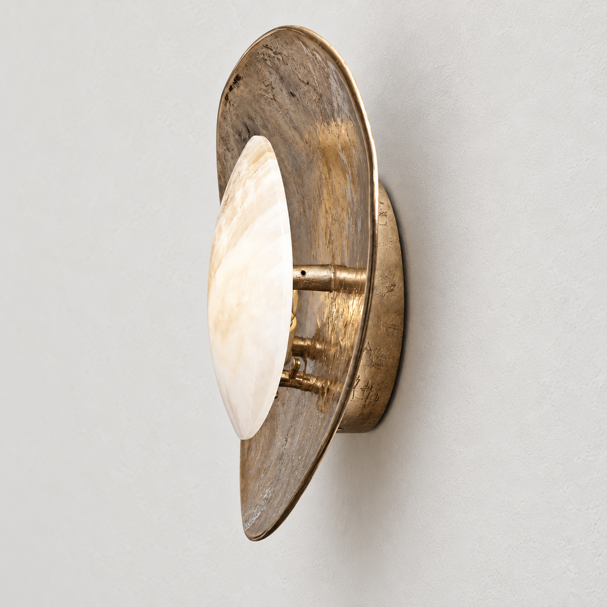 Side view of the marble panel, brass reflector and mounting supports.