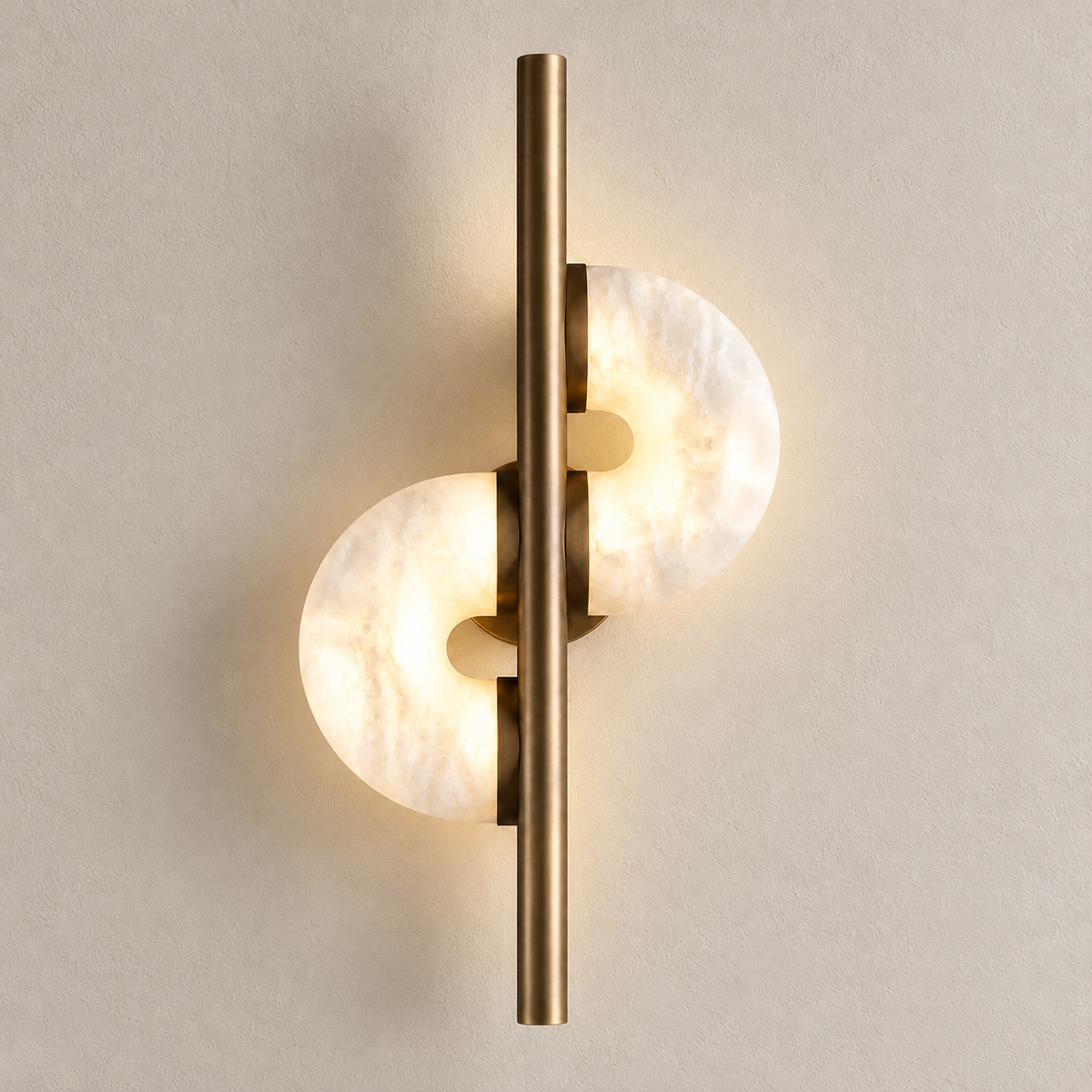 Illuminated alabaster discs showing their cloudy mineral structure.