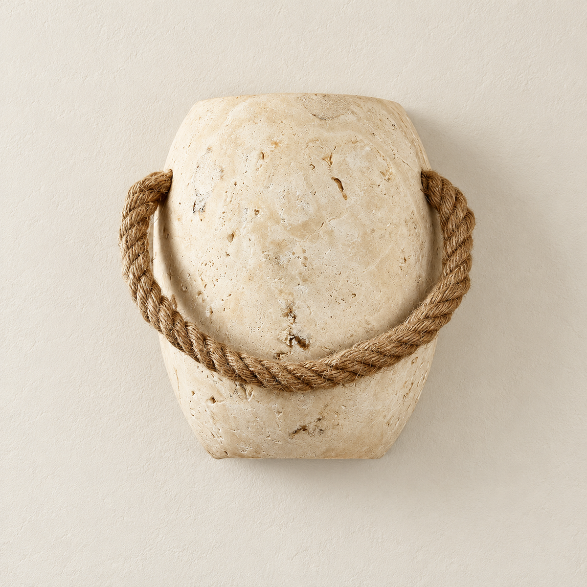 Travertine wall sconce with a twisted rope loop, front view with the light off.