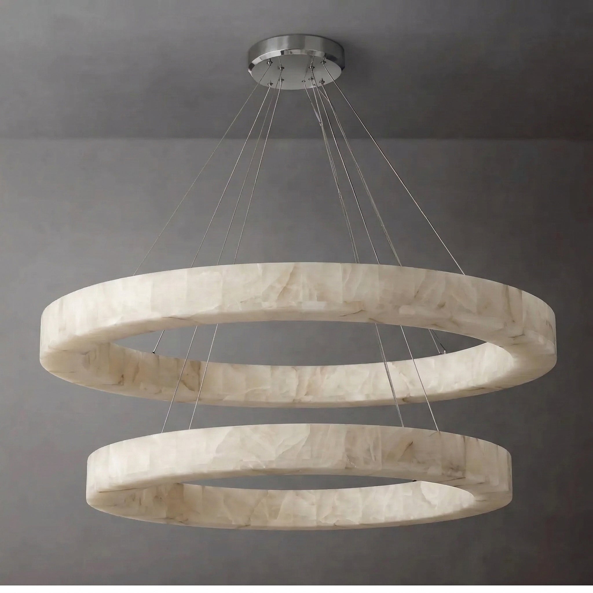Double-ring alabaster chandelier in a living room
