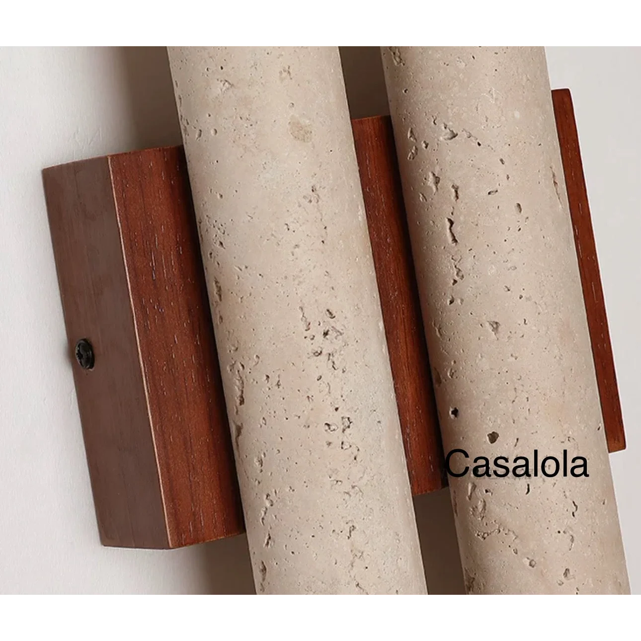 Double travertine sconce glowing warm
