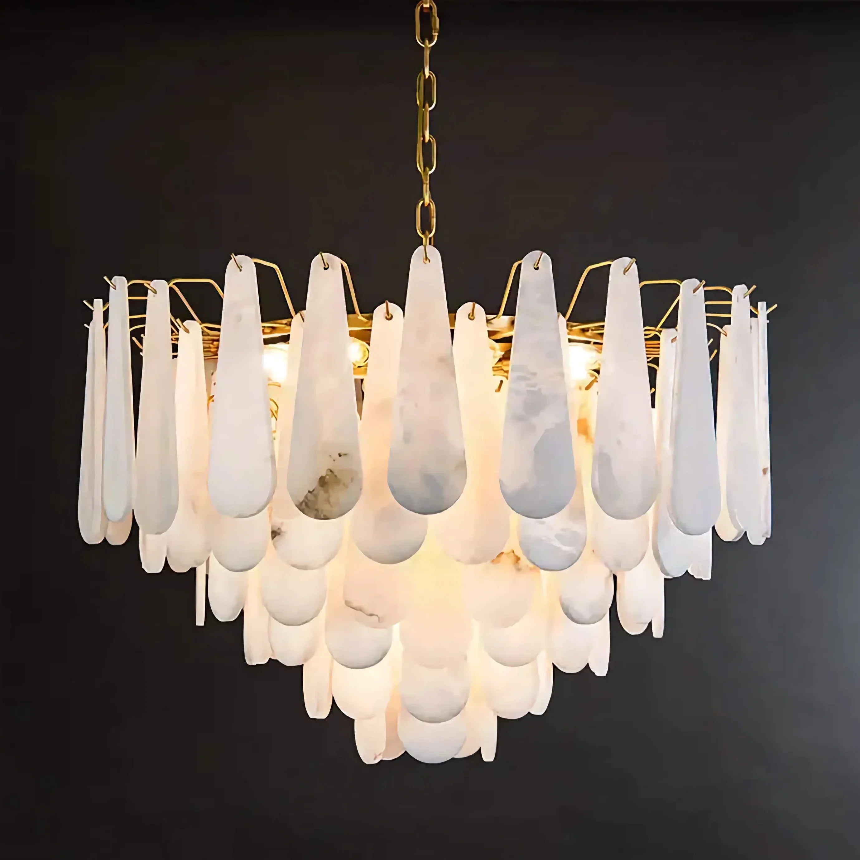 Cascading hand-carved alabaster teardrops glowing from within