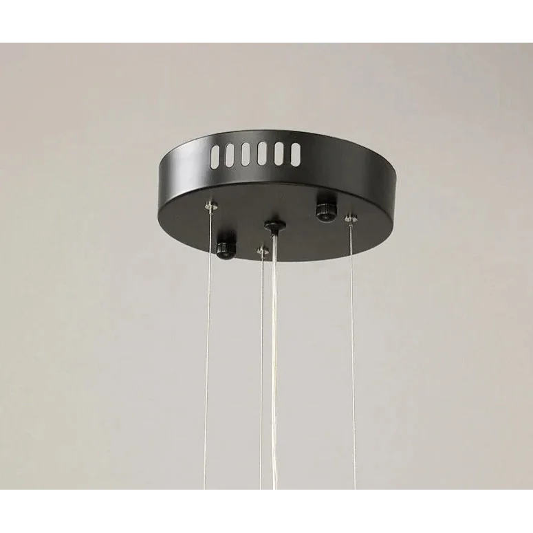 Tiered acrylic pendant in a living room