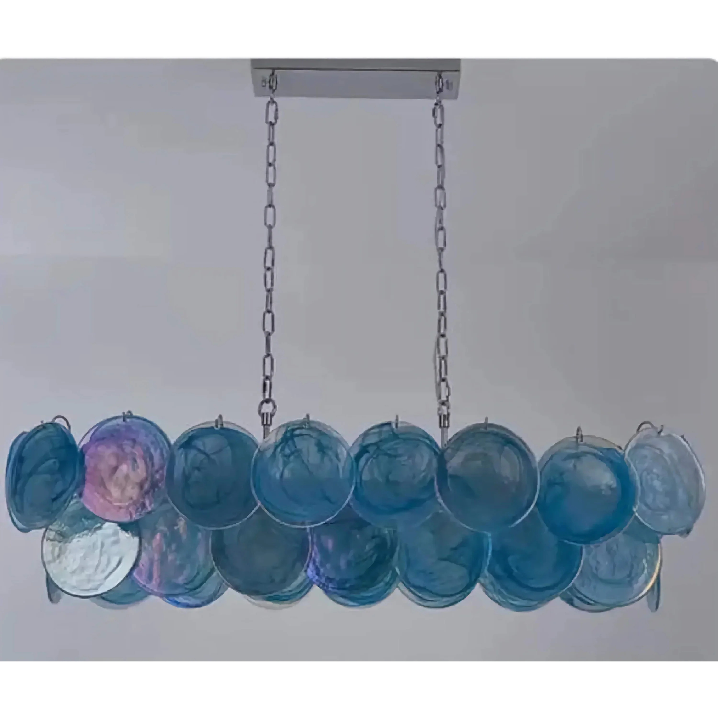 Double row of hand-blown iridescent green glass discs on a copper frame