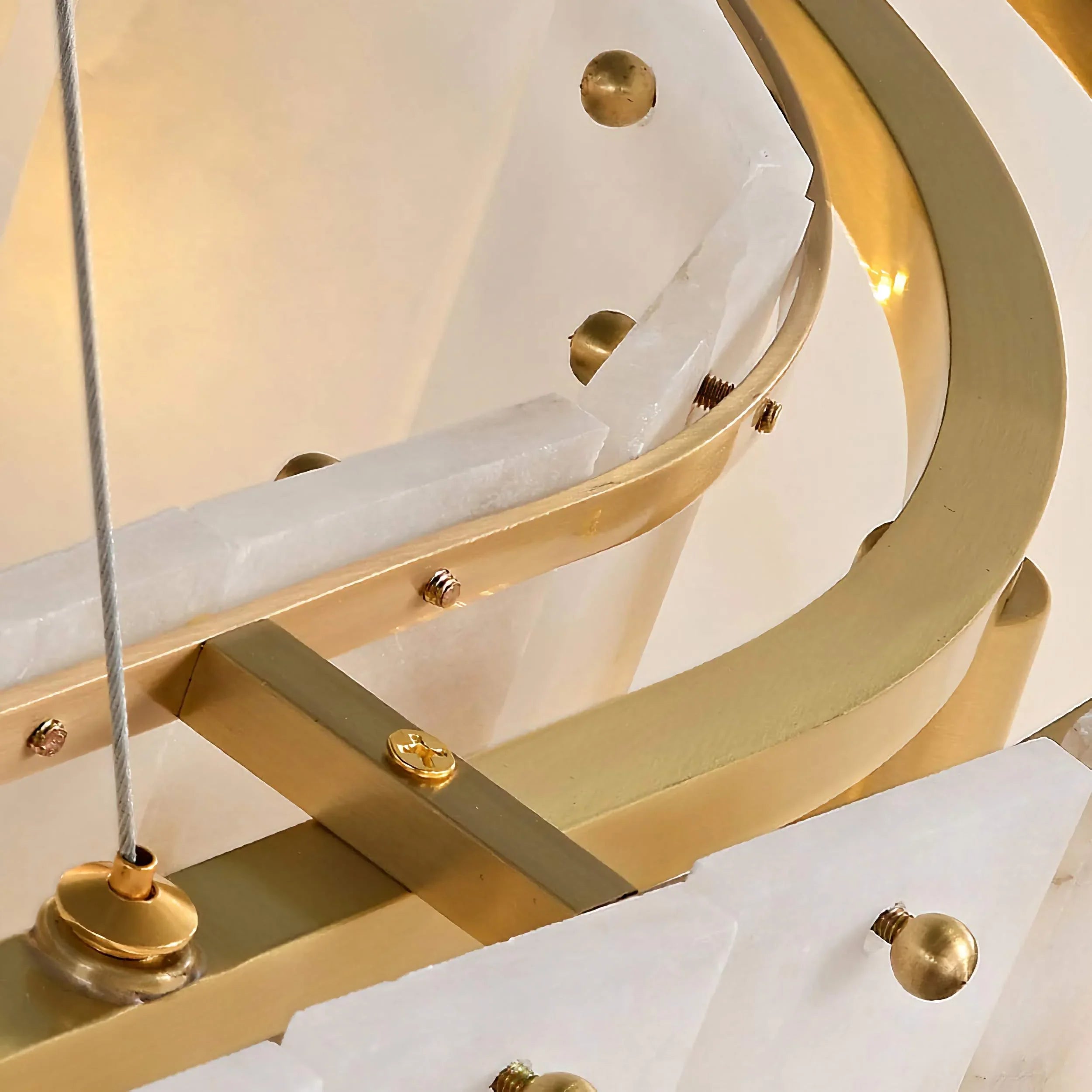 Oval alabaster chandelier floating on fine cables