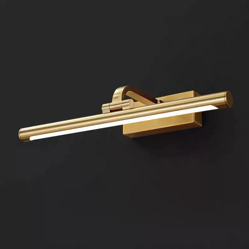 Brass linear LED picture light on a black background