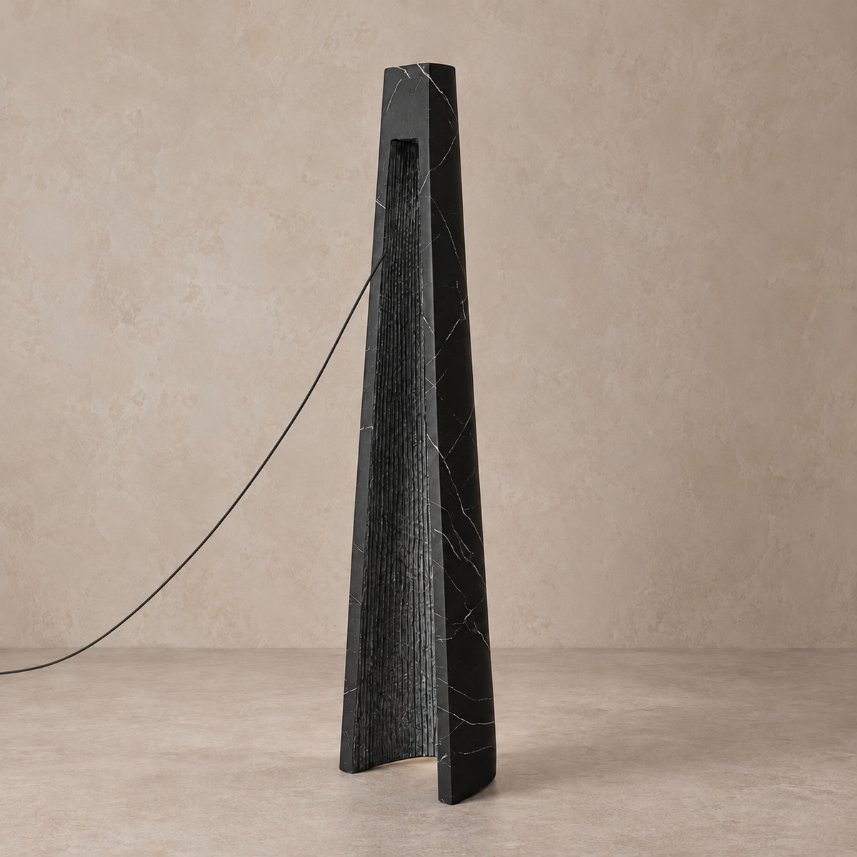 Maestà Nera CLUP850M switched off, showing its tapered black marble-look body and recessed channel.