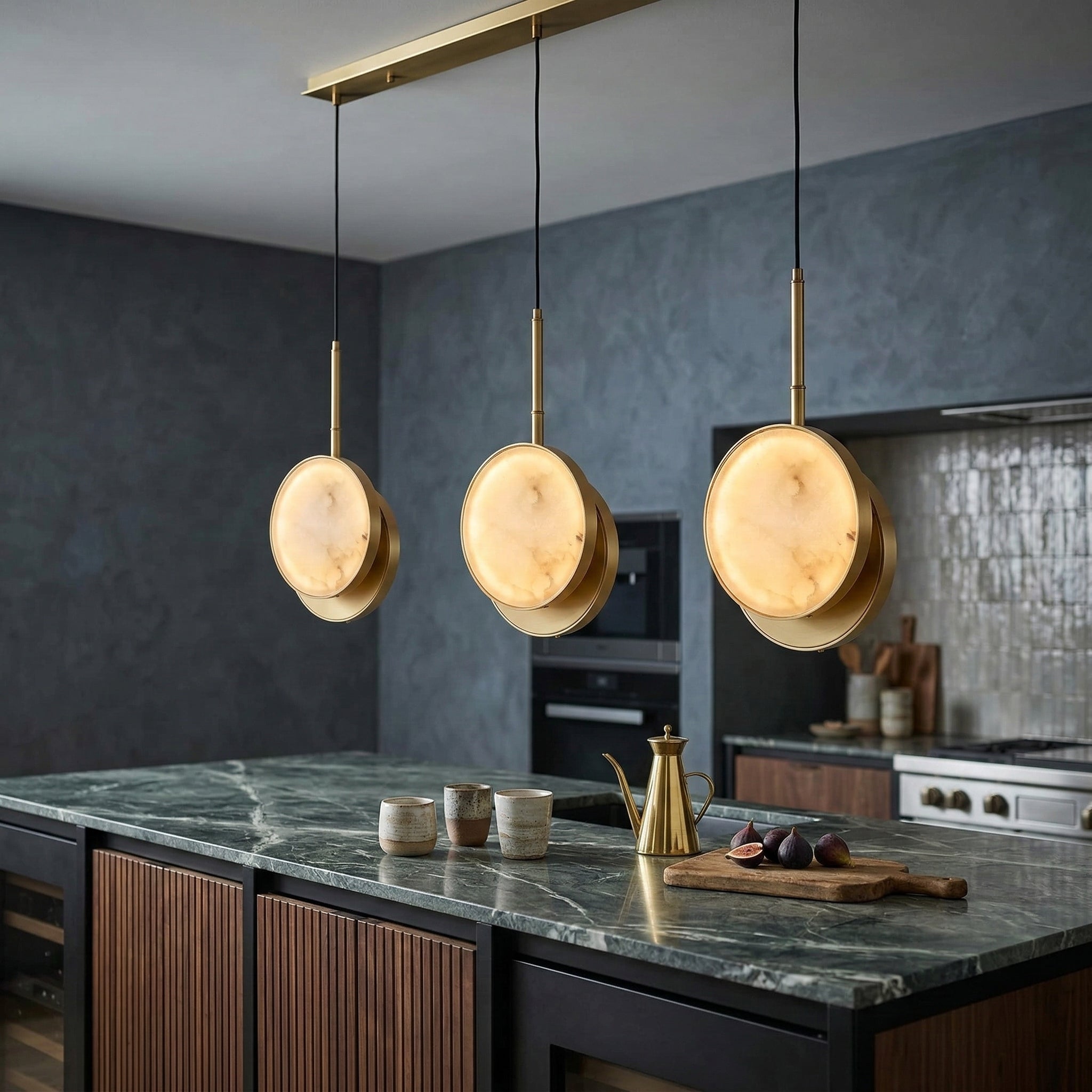 Cluster of alabaster pendants above a table