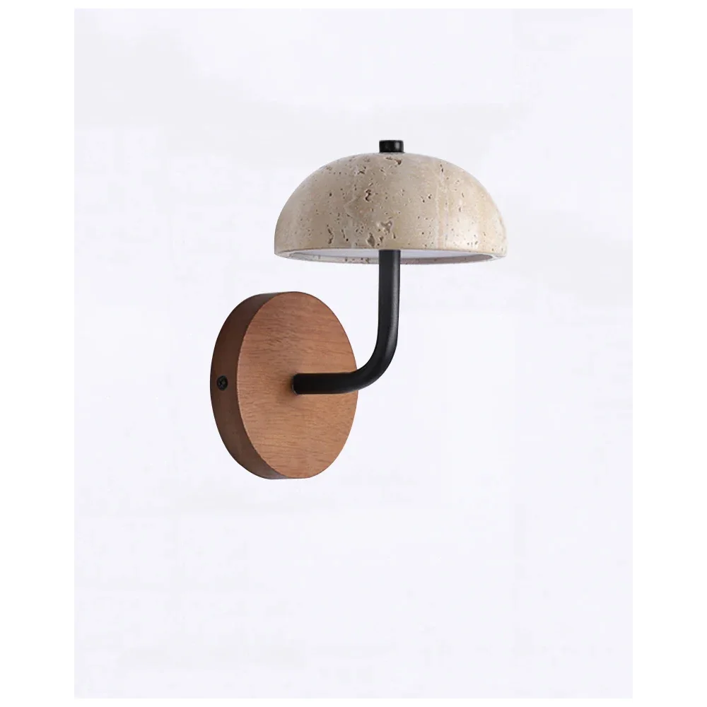 Minimalist travertine sconce on a wall