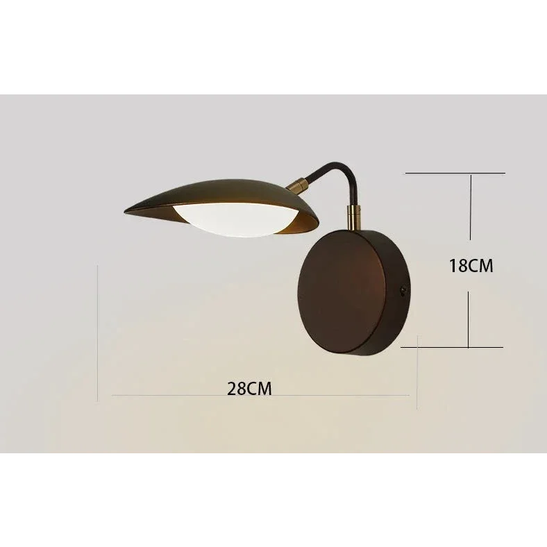 Minimalist black wall lamp with directional arm