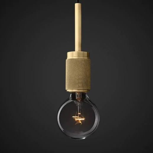 Exposed bulb beneath brass disc