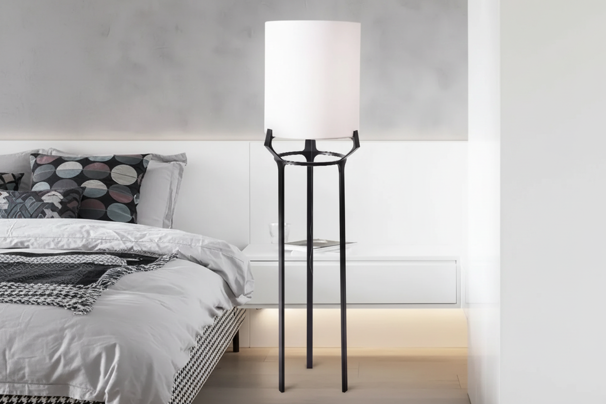 White fabric shade on a slim floor lamp