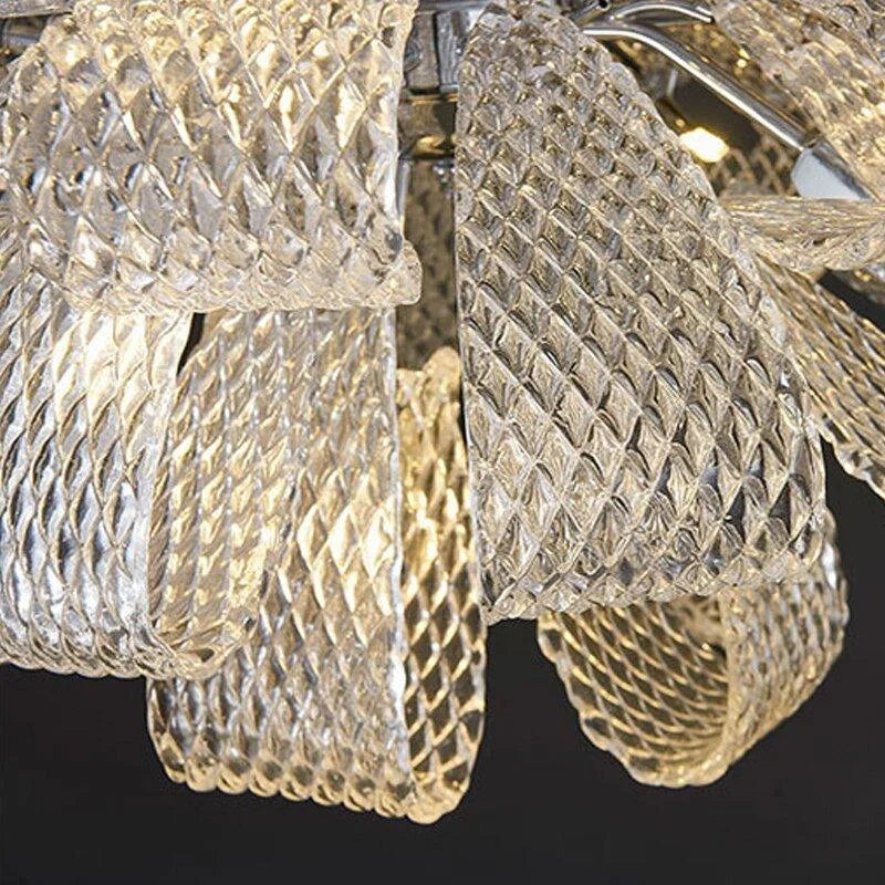 Glass petal chandelier glowing warm