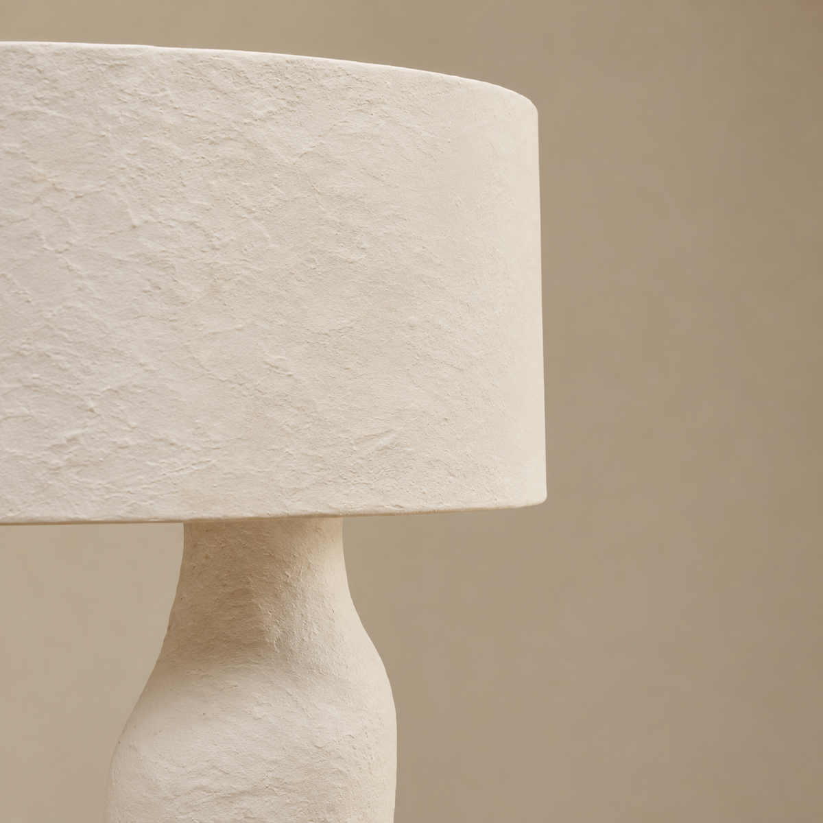 Close-up of the Mountain lamp’s textured resin shade and irregular shoulder.